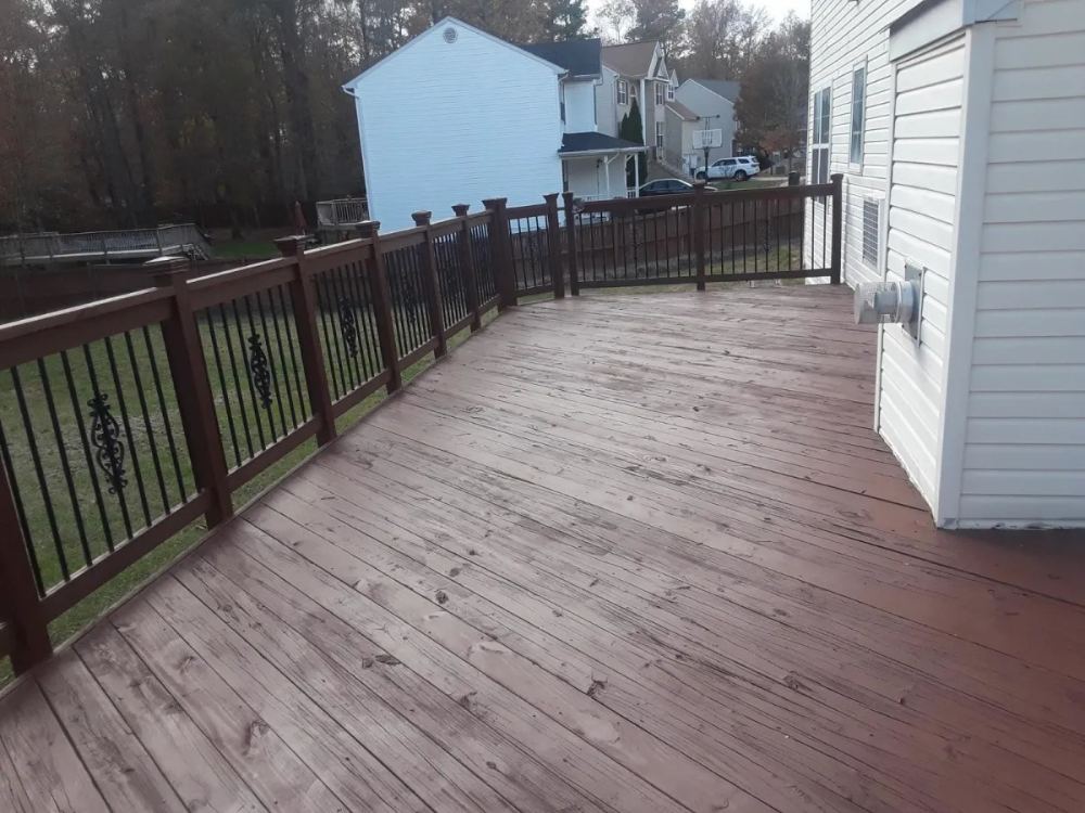 Same deck after full re-stain and board replacement