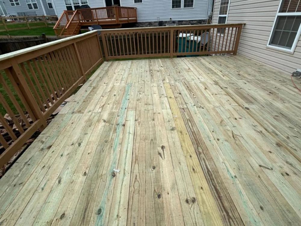 Same deck with all new boards installed after structural repair