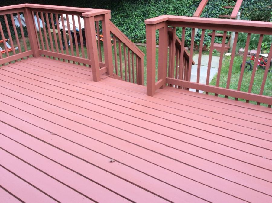 Painted red deck with matching railings